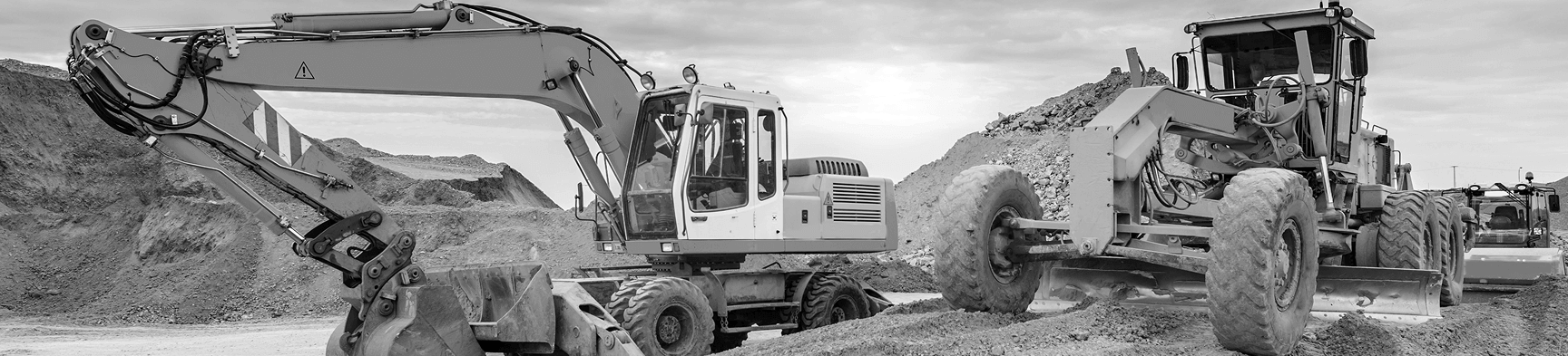 black and white image of construction equipment